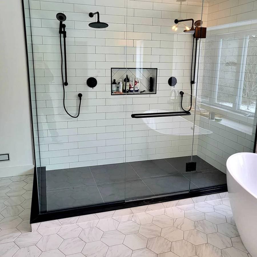 Picture of a newly remodeled bathroom with custom tile and tile flooring